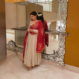 Cream Anarkali Suit with Red Bandhani Dupatta
